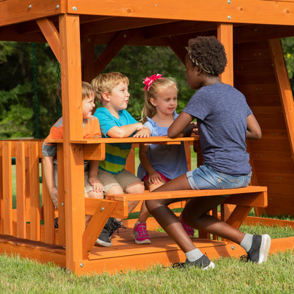 Backyard Discovery Skyfort II Cedar Wood Swing Set with Wave Slide, Raised Clubhouse, Crow's Nest, Monkey Bars, Balcony, Belt Swings, Trapeze, Rock Wall, Picnic Table, Sandbox, Ladder, Outdoor Playset